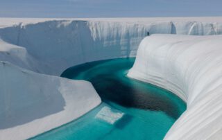Photograph of Greenland’s melting glaciers by James Balog, from Chasing Ice, Rizzoli.
