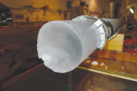 Cylinder 130000-year-old ice drilled from Greenland ice sheet (2013).