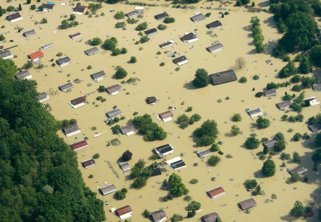 Aerial view of the flooded Danube River in Deggendorf, Germany on Friday, June 7, 2013. (AP Photo/Armin Wegel